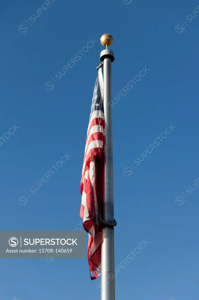 An American flag hanging down