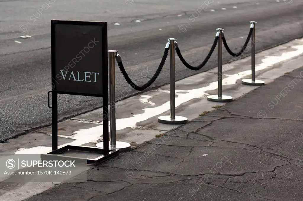 Sign and stanchions for valet parking