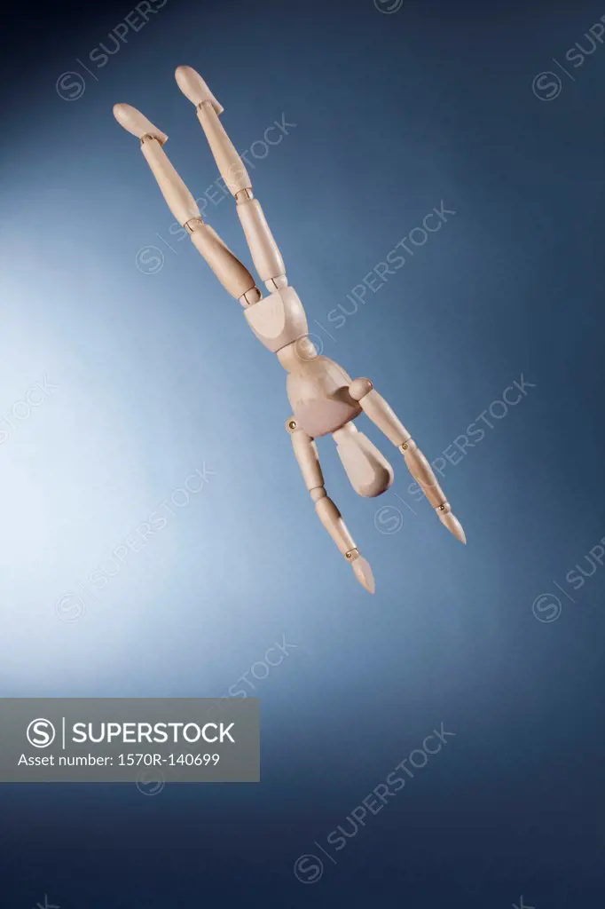 An upside down artist's figure falling in mid-air