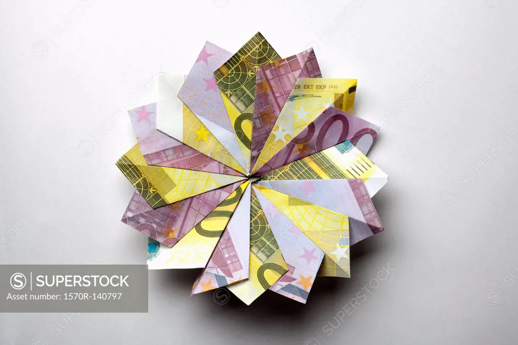 European Union currency folded into a pinwheel shape