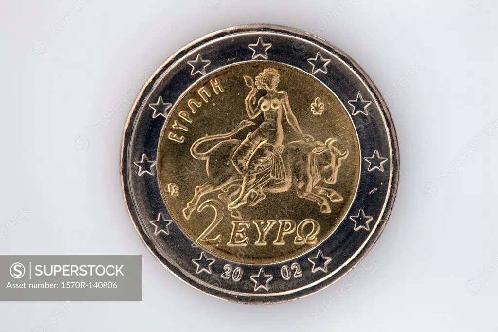 Rear view of a two Euro coin with image of Europa riding a bull
