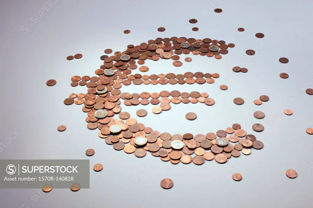 European Union coins arranged into the shape of a Euro symbol