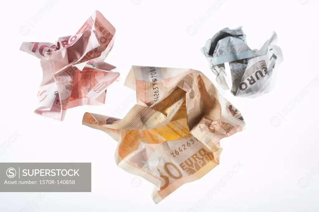 Crumpled Euro banknotes on a white background