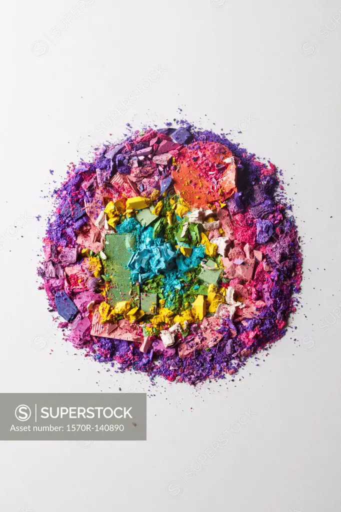Crushed various make-up powders arranged into a circle
