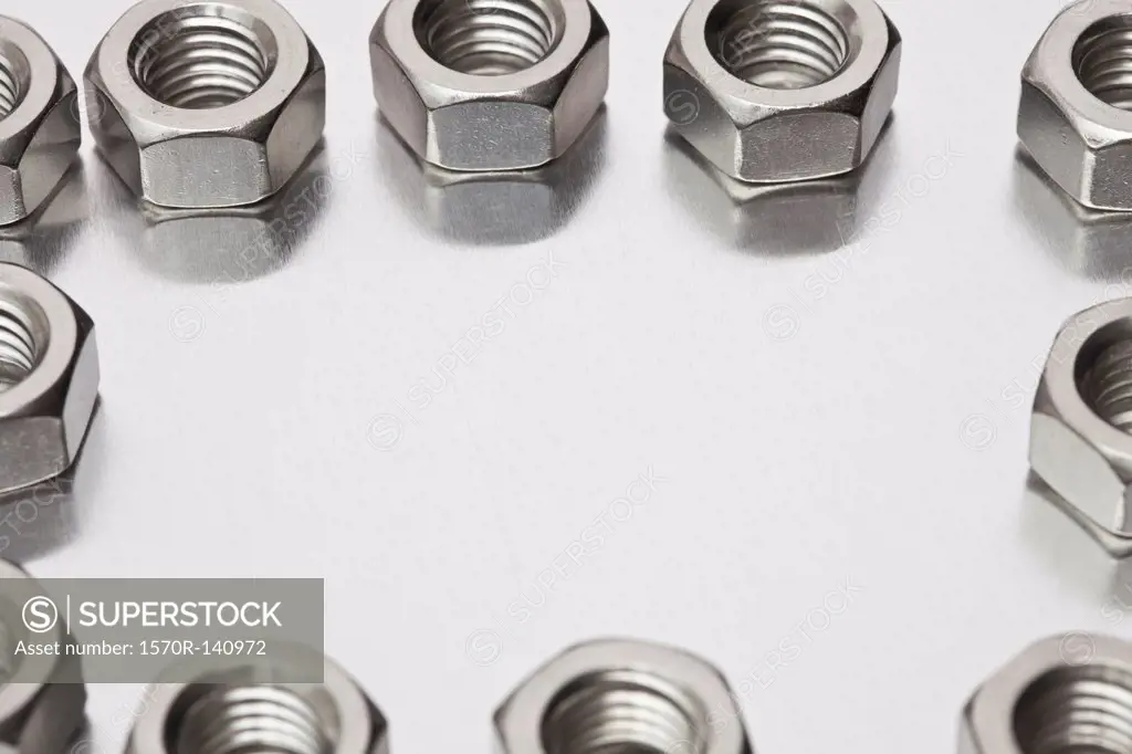 Metal nuts arranged in a circle