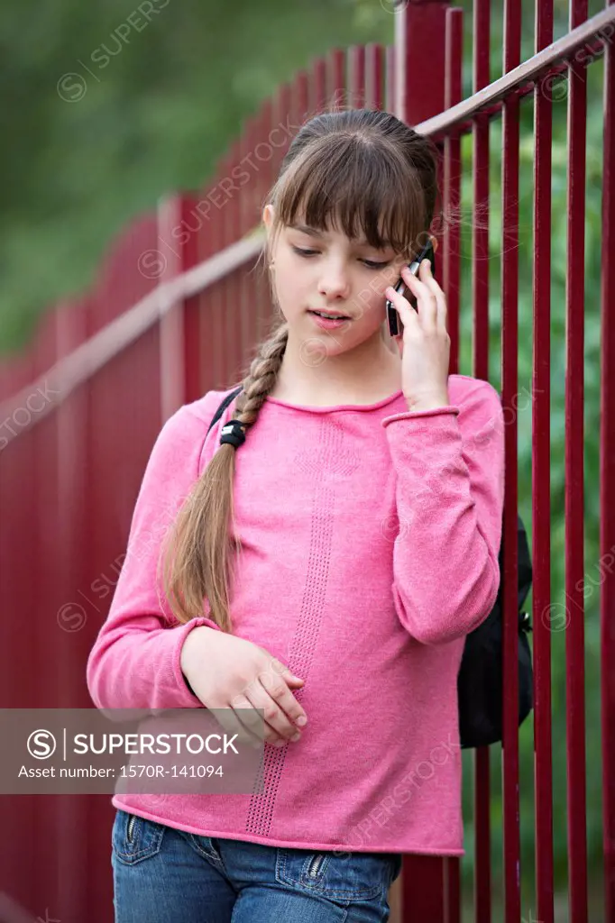 A girl using a mobile phone