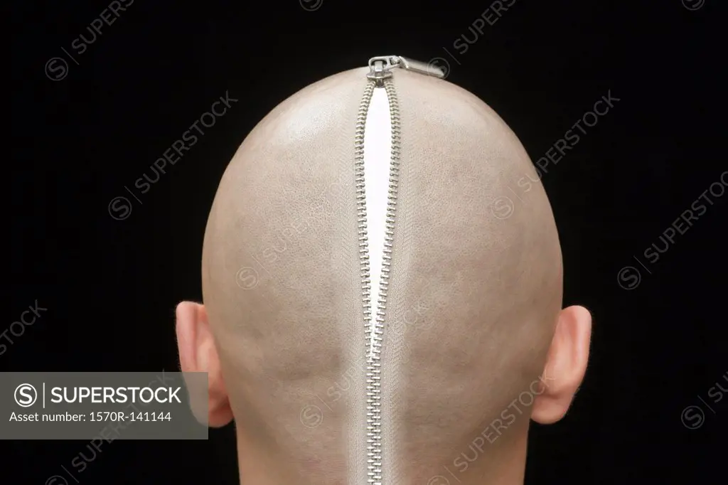 An open zip on the head of a man, rear view