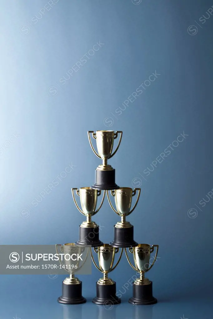 Loving cup trophies stacked in a pyramid