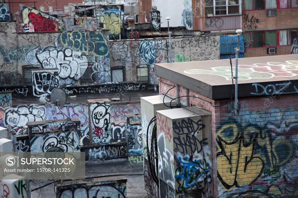 Graffiti covered tenement rooftop in Chinatown