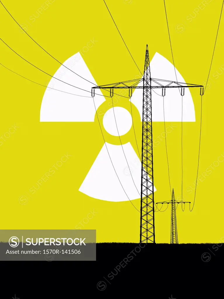 Nuclear power sign in sky with electricity pylons in foreground