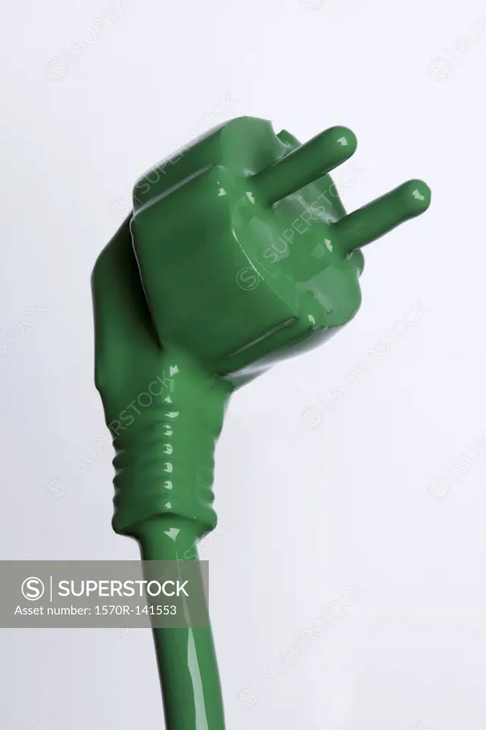 A plug and cable painted green