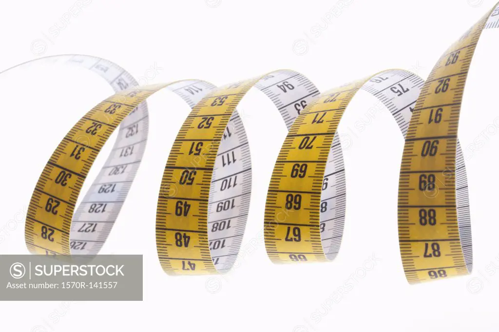 A centimeter tape measure arranged in a spiral shape