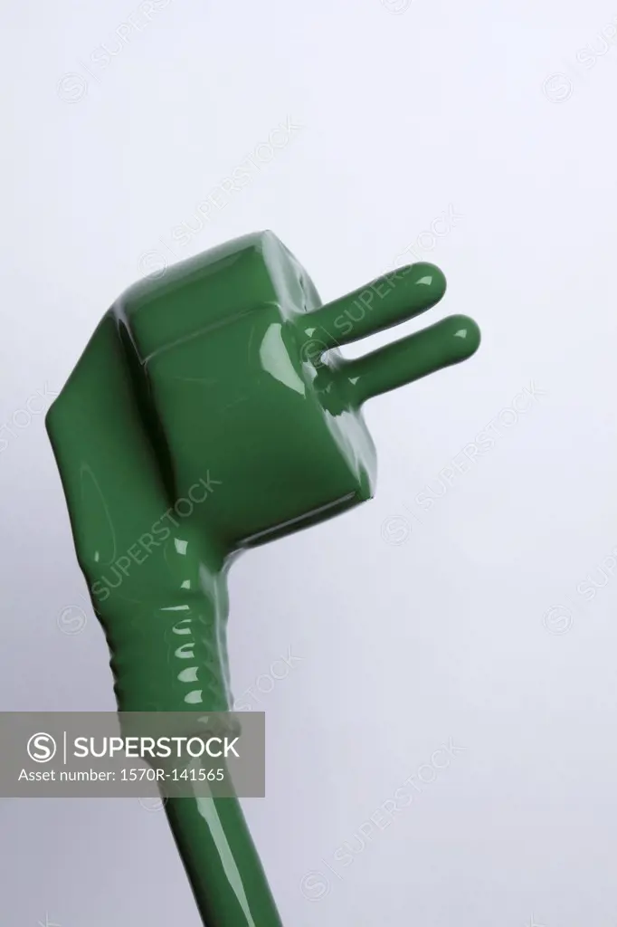A plug and cable painted green