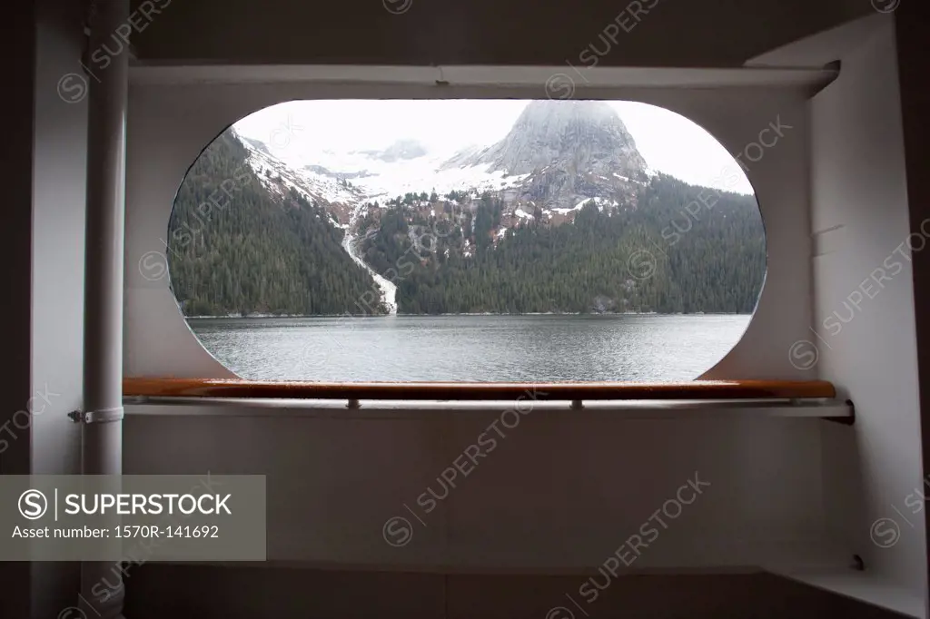 View of Tracy Arm fjord through the window of a passenger ship, Alaska
