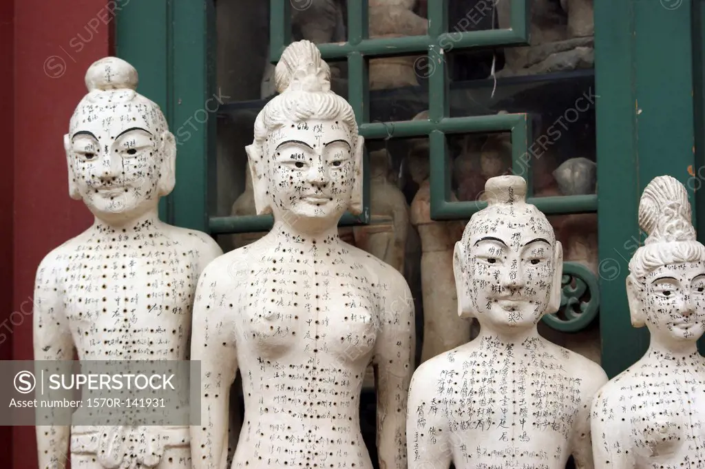Acupuncture statues at Panjiayuan Antique Market, Beijing, China