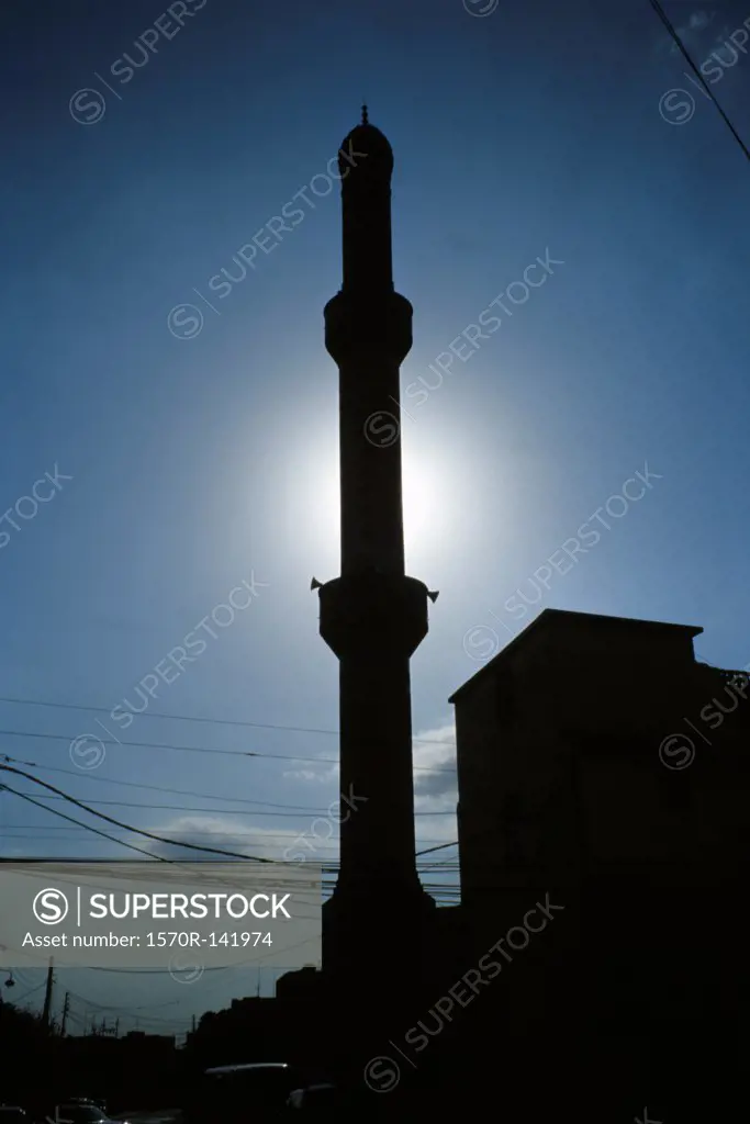 Silhouette of minaret and power lines in Arbil, Iraqi Kurdistan, Iraq
