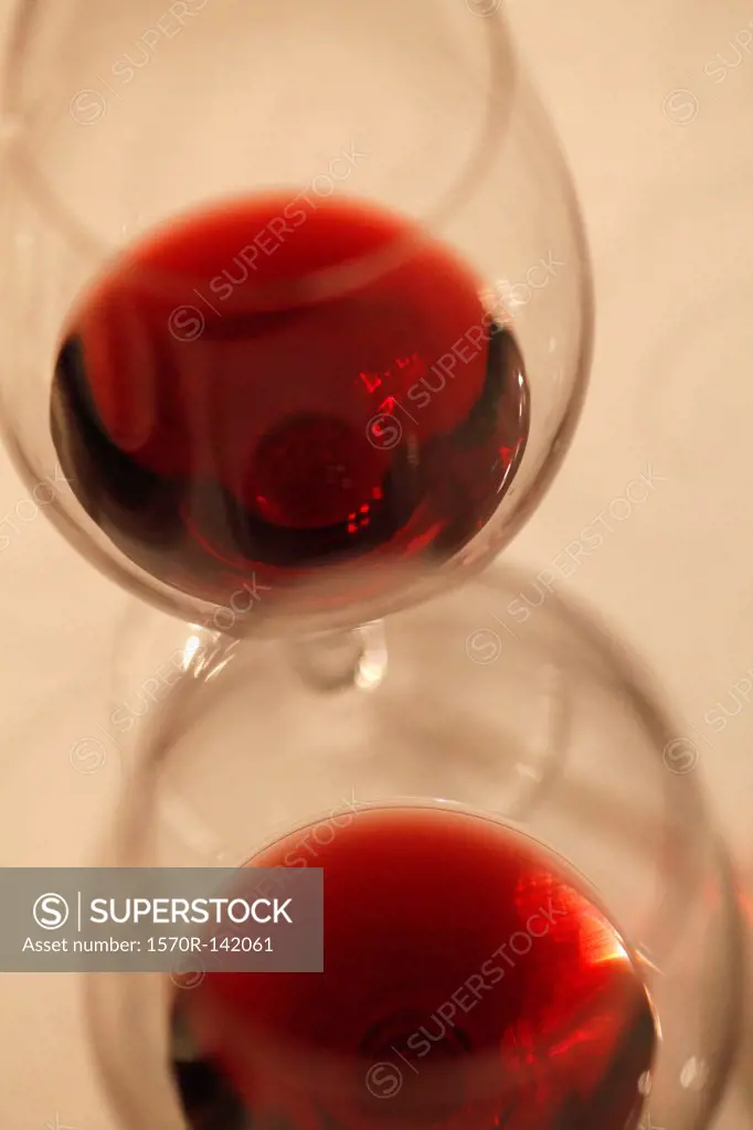 Two wineglasses with red wine in them at a wine tasting