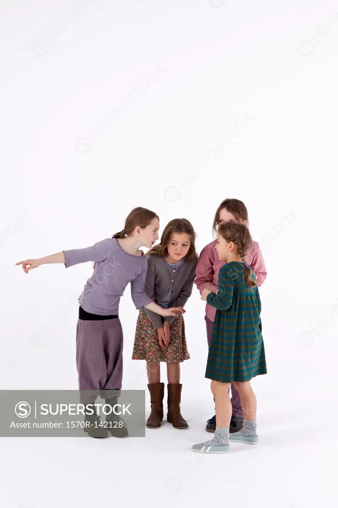 A group of gossiping little girls