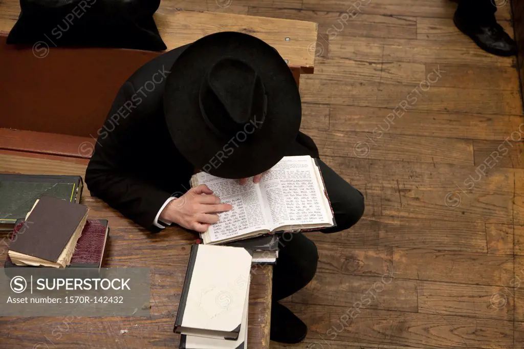 Jewish man reading religious text