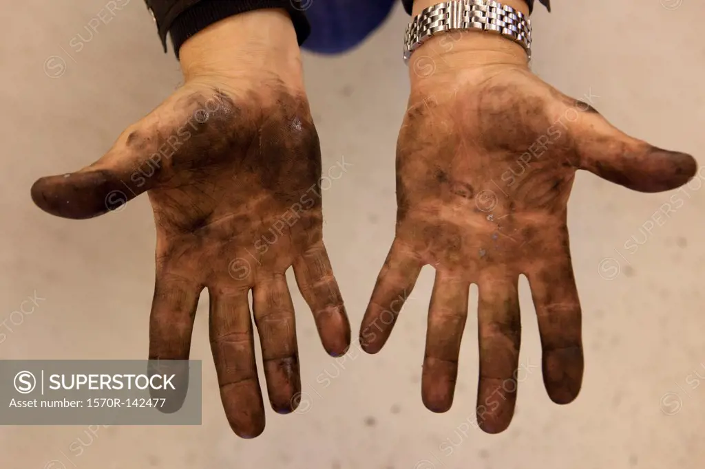 Mechanic's dirty hands