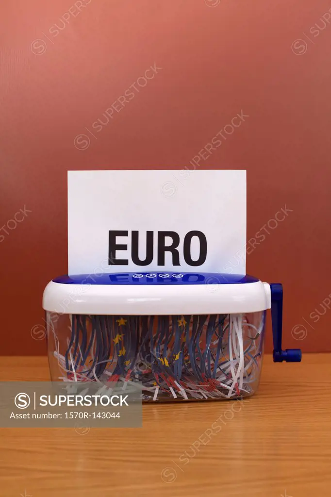 Word 'euro' going through shredding machine