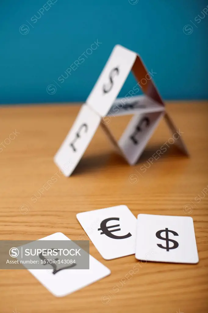 A house of cards of various currency