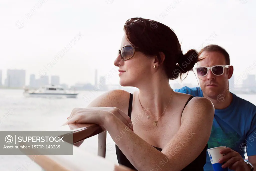Man and woman on river boat to Asakusa in Tokyo