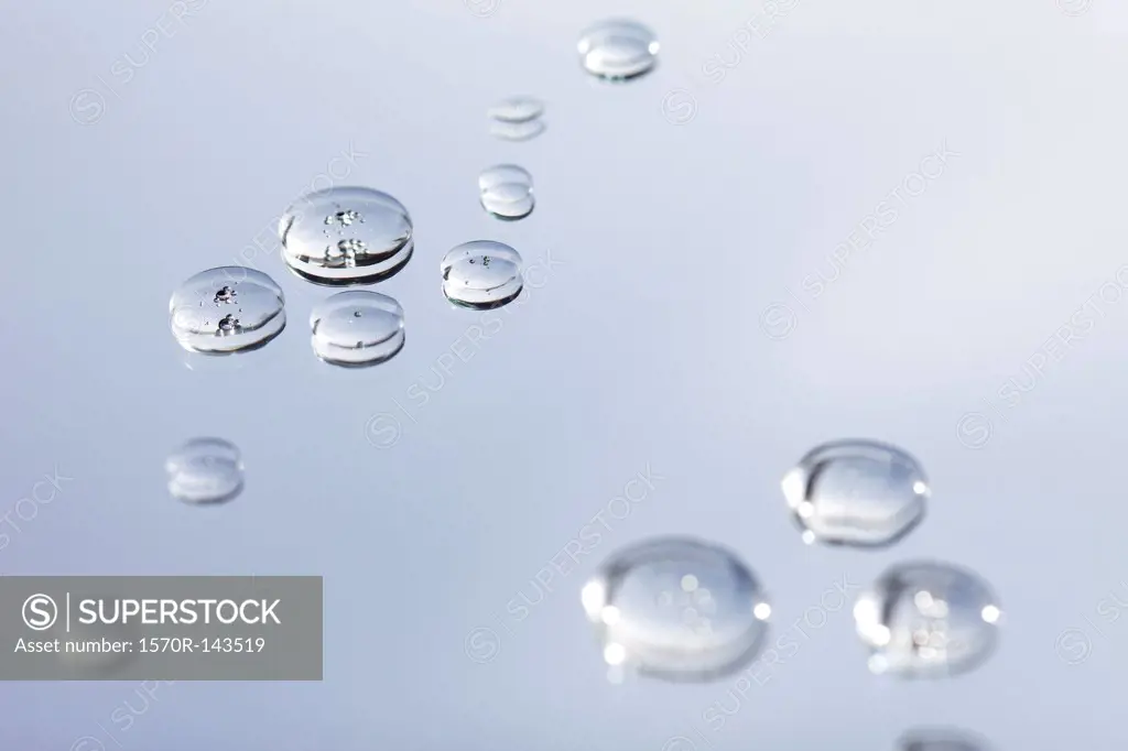 Water drops on a light gray background