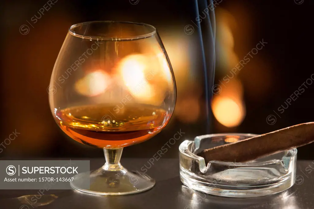Brandy glass and cigar