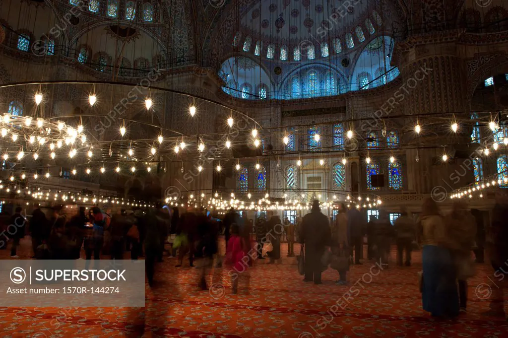 Tourists in the Blue Mosque, Istanbul, Turkey