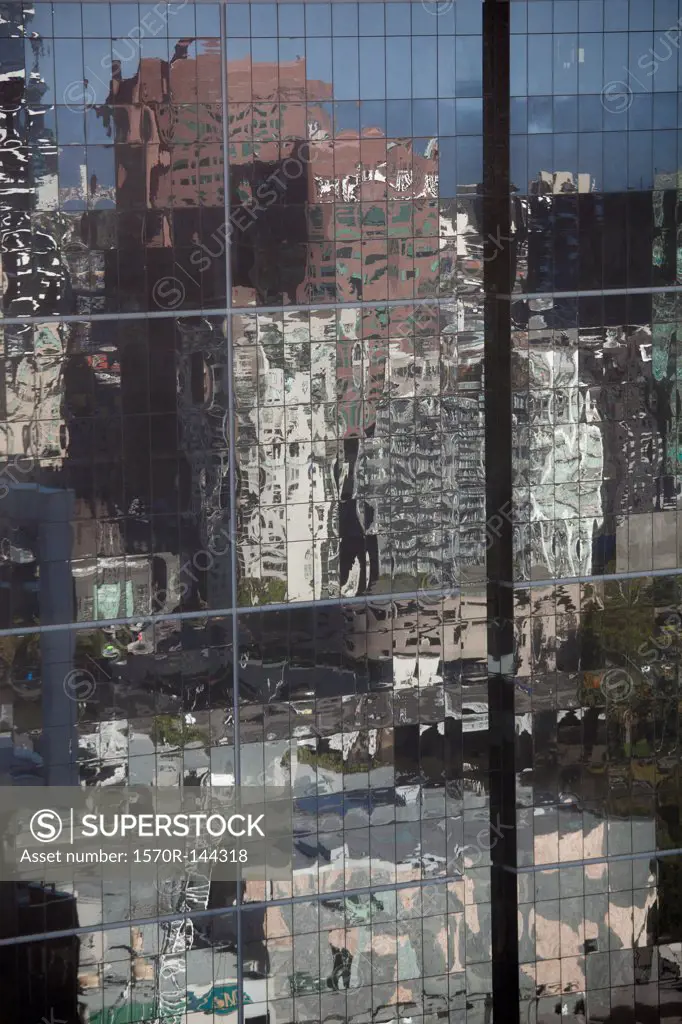 Distorted reflections of city skyscraper  in Melbourne, Victoria, Australia