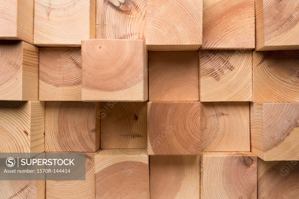 A grid of wooden blocks arranged in varying lengths