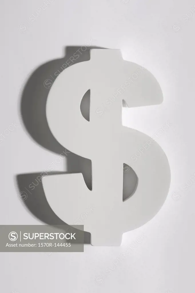 A white block dollar sign, close-up