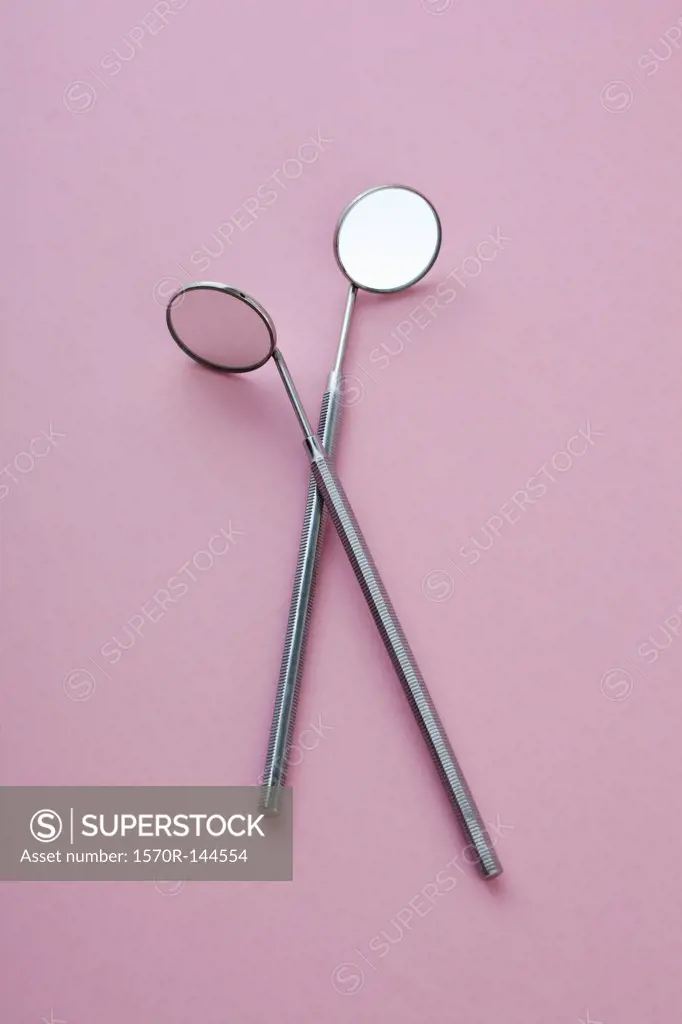 Two angled dental mirrors
