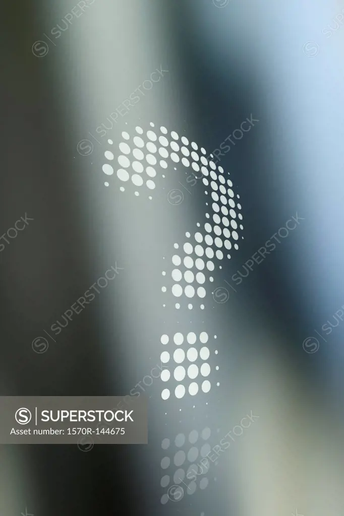 Dot patterned question mark against a background of shadow and light