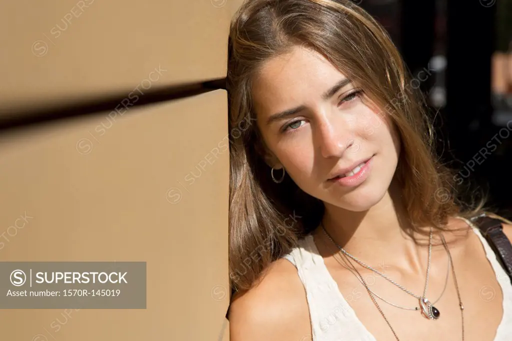 Young woman looking at camera, close-up