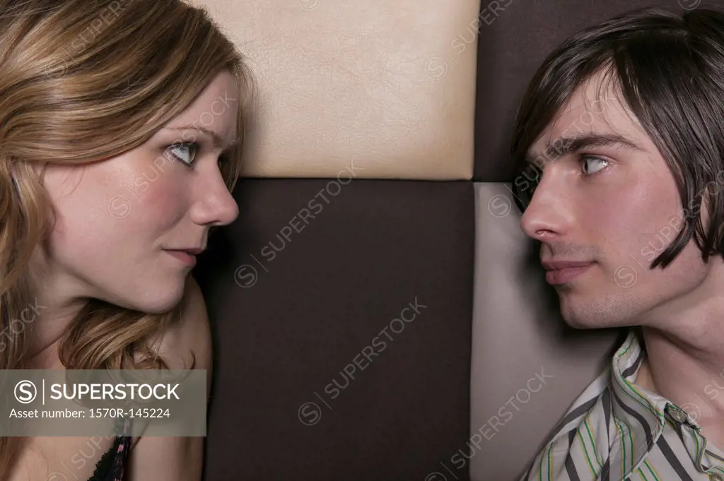 A couple looking at each other intensely, close-up
