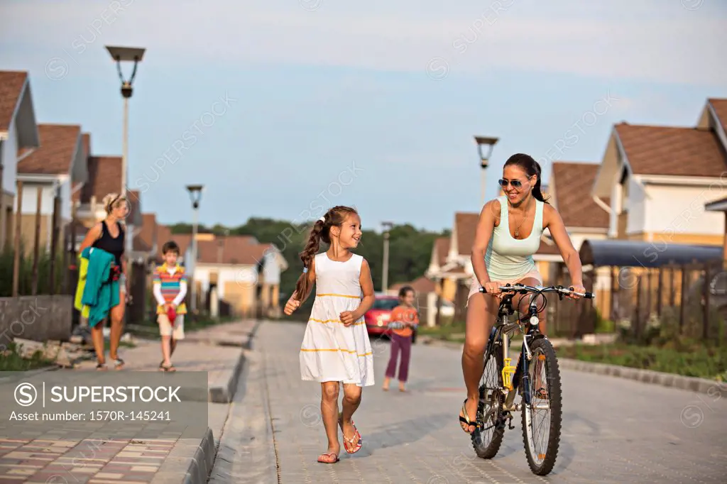 Young woman riding bicycle