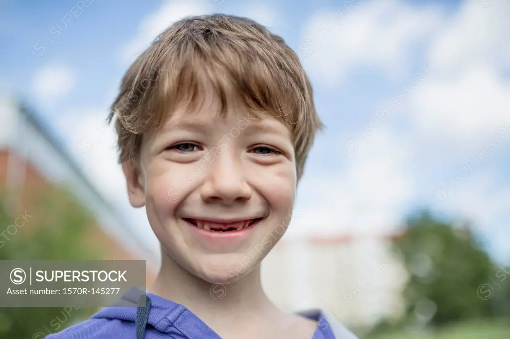 Portrait of boy smiling, close-up