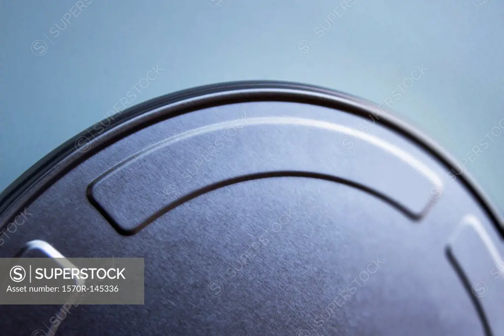 Extreme close up of the top of a film reel canister