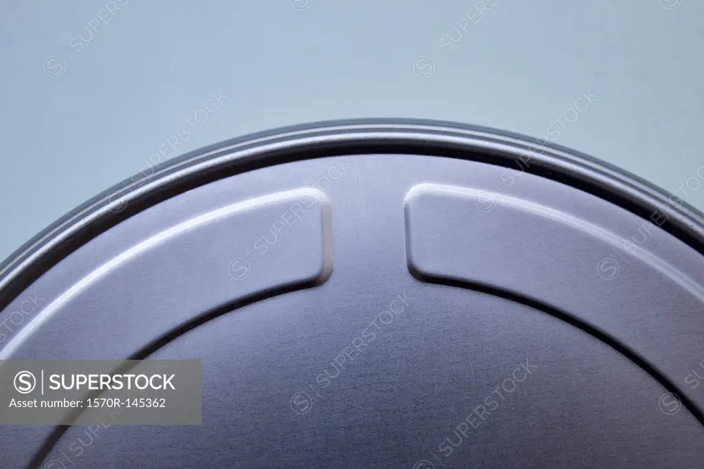 Extreme close up of the top of a film reel canister