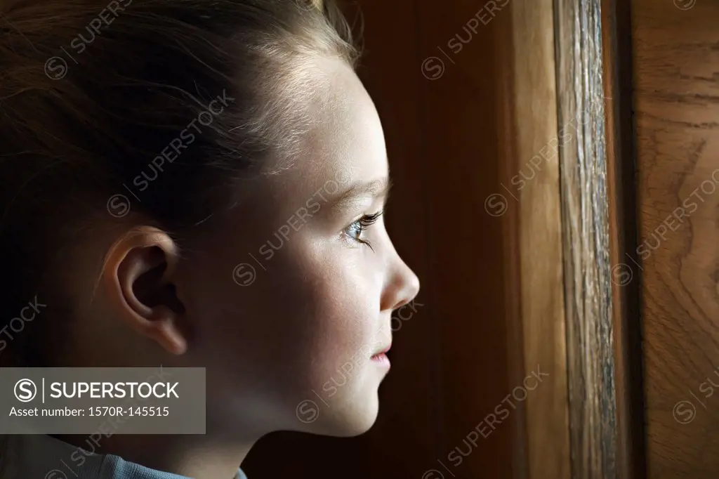 Girl looking away, close-up