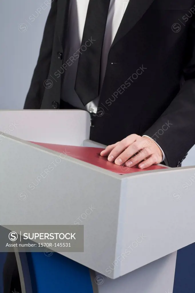 Businessman at lectern