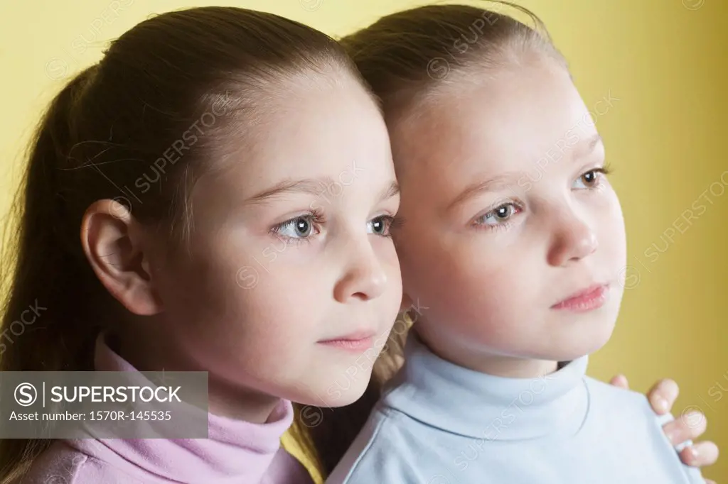 Close-up of girls, looking away
