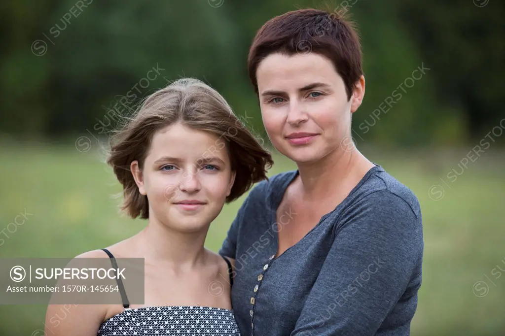 Portrait of mother and daughter, close-up