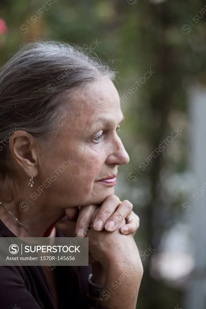 Senior woman looking away, close-up