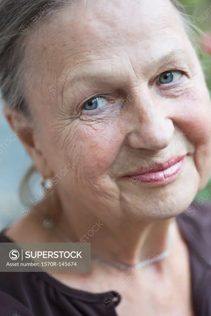 Senior woman looking away, smiling