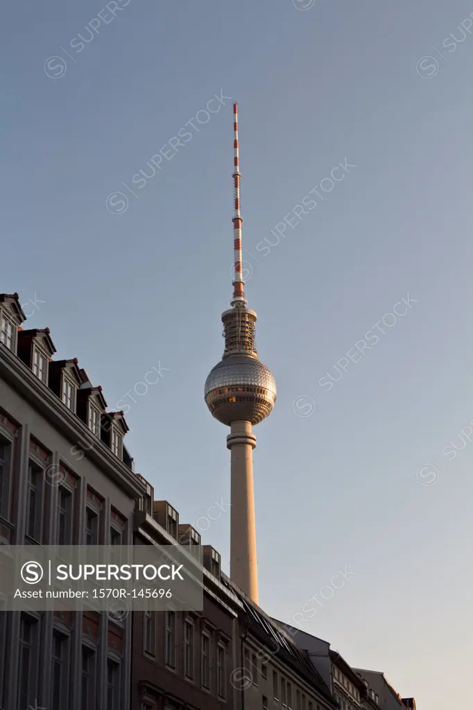 Alexanderplatz Television Tower, behind apartment buildings, Berlin, Germany