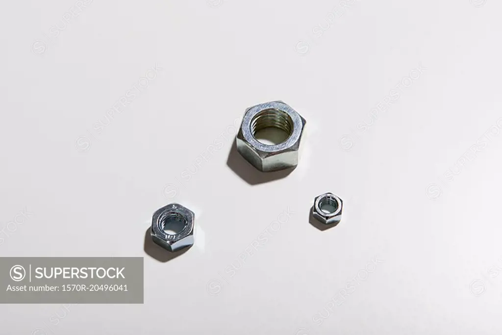 Close-up of bolts on white background
