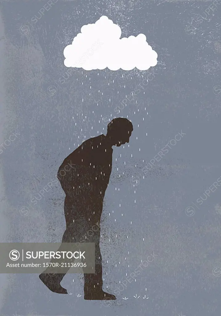 Rainfall over sad man against gray background